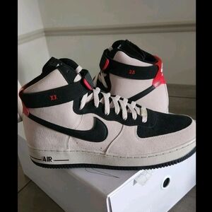 Nike Black and Cream High-Top Sneakers with Red Accents